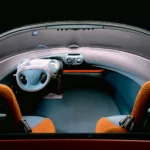 Close-up of the Renault Racoon’s futuristic, rugged design highlighting its bold 1990s styling