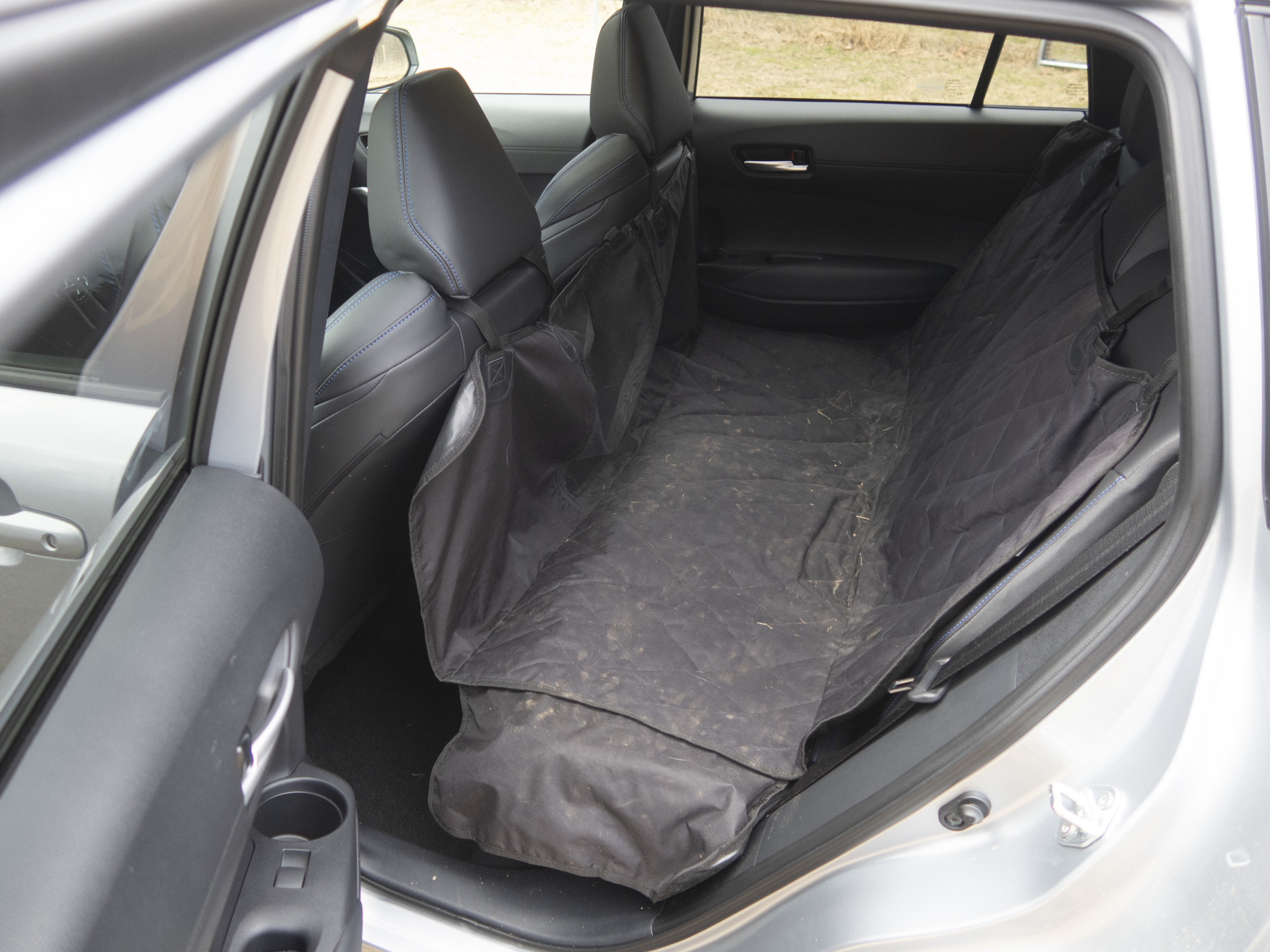 Cargo bay of the 2025 Toyota Corolla Cross, showing versatility for luggage and pet travel.