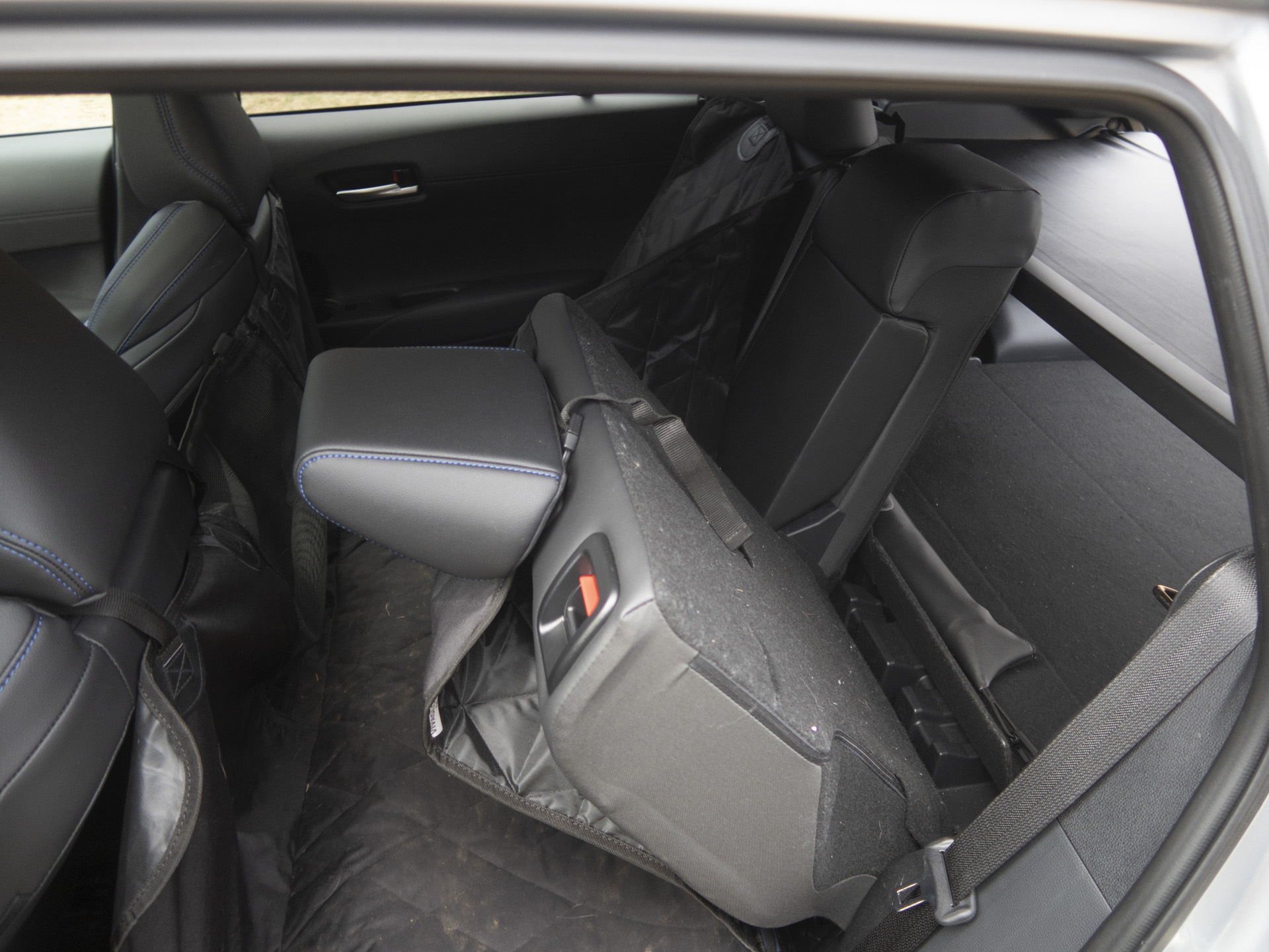 Close-up of the Hybrid badge on the 2025 Toyota Corolla Cross, emphasizing its fuel efficiency.