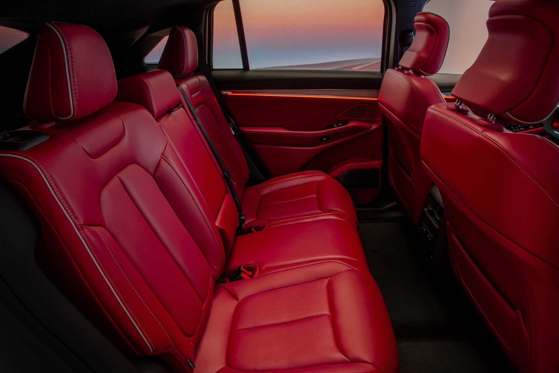 Interior of the 2024 Jeep Wagoneer S with the optional Radar Red interior, adding a bold color choice.