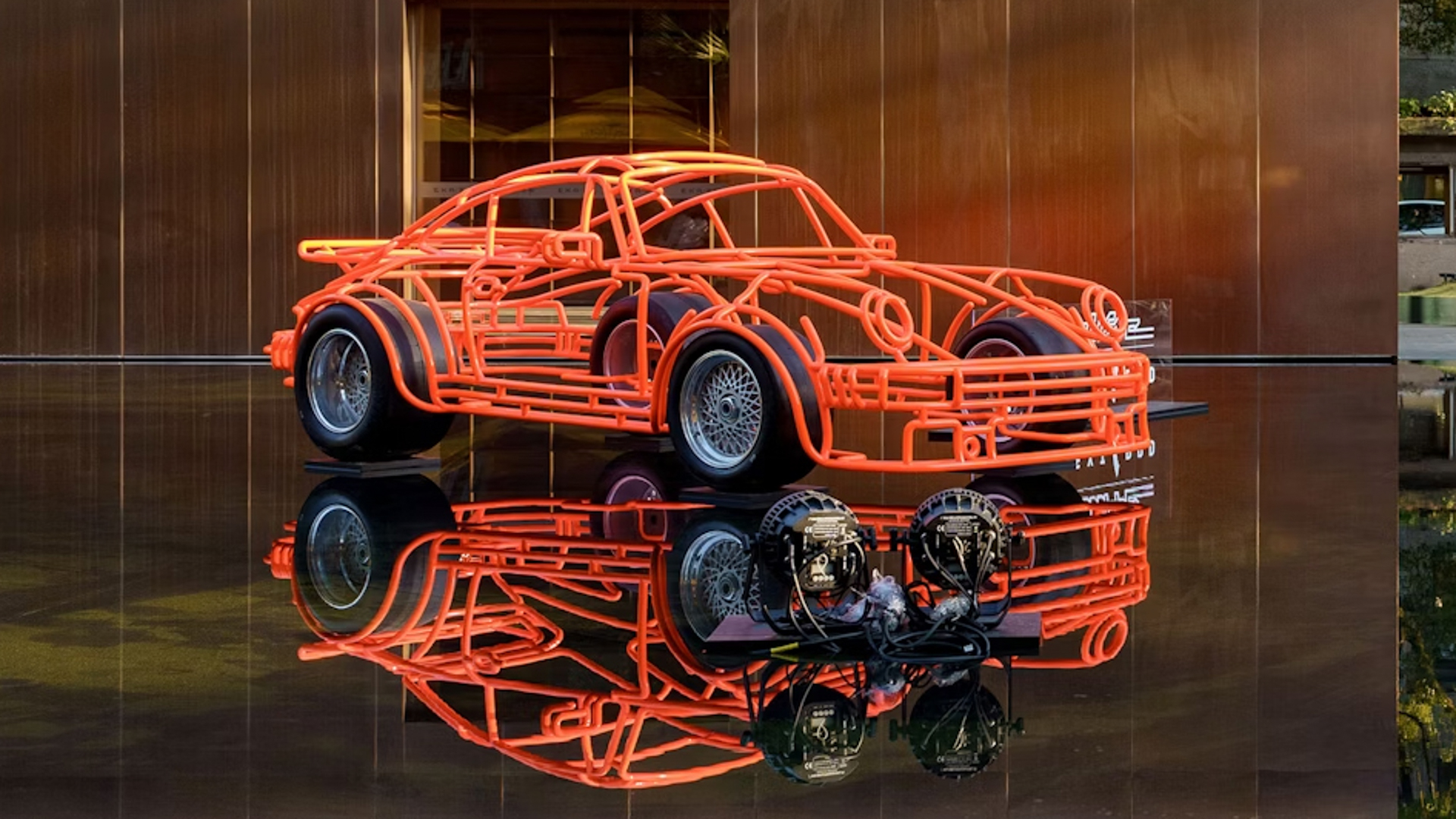 Benedict Radcliffe working on his next tubular steel car sculpture, showcasing his craftsmanship.