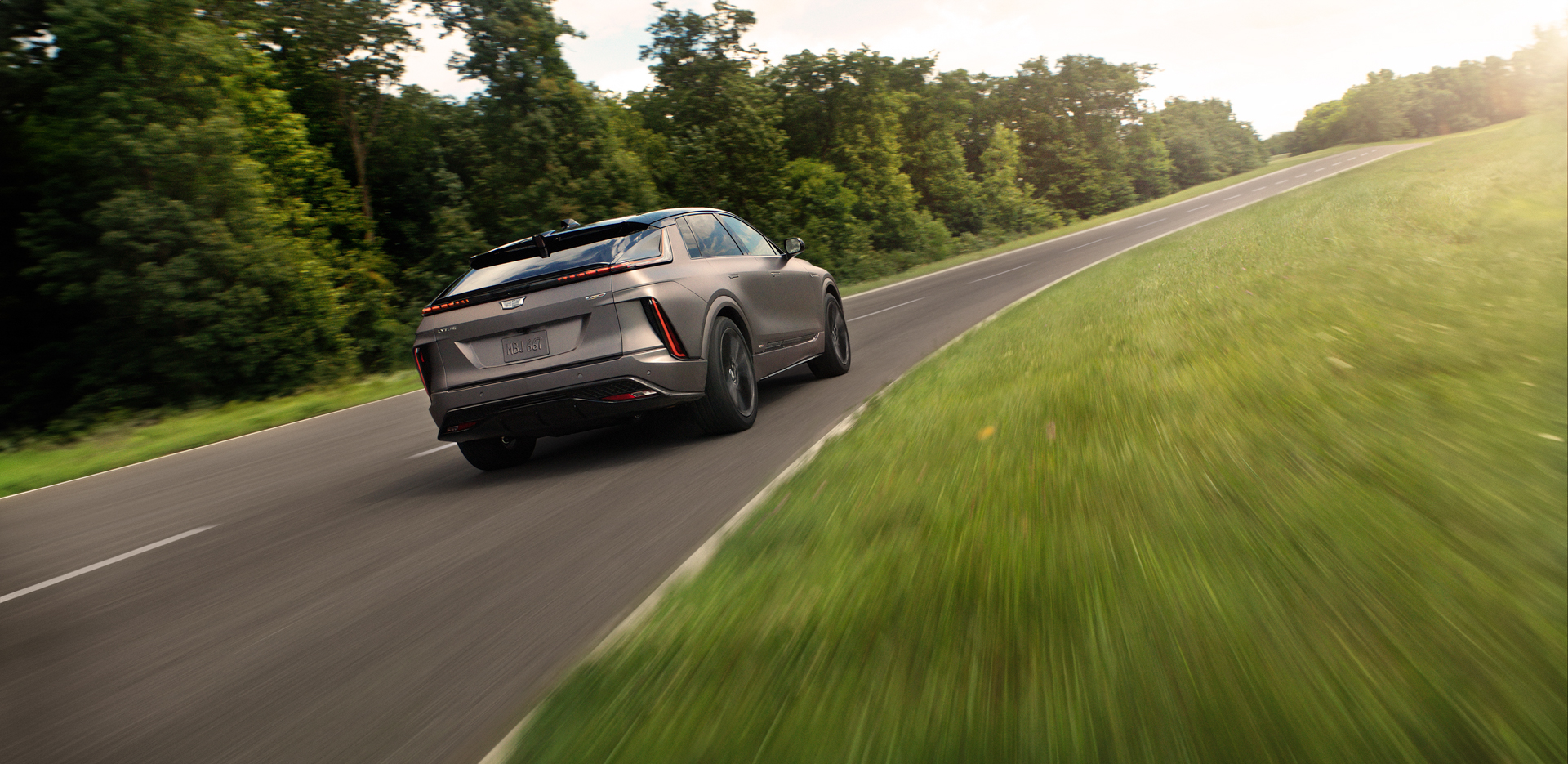Cadillac Lyriq V in motion, showcasing its dynamic performance and sleek design.