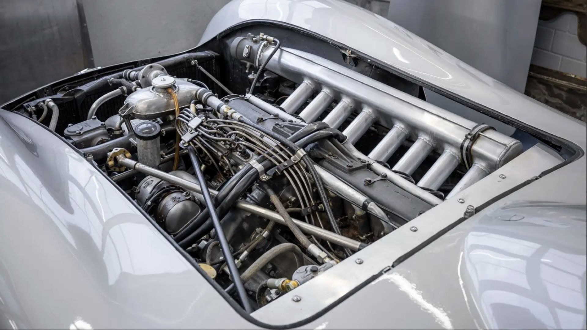 The iconic Mercedes-Benz W196R racing at Monza with its streamlined body