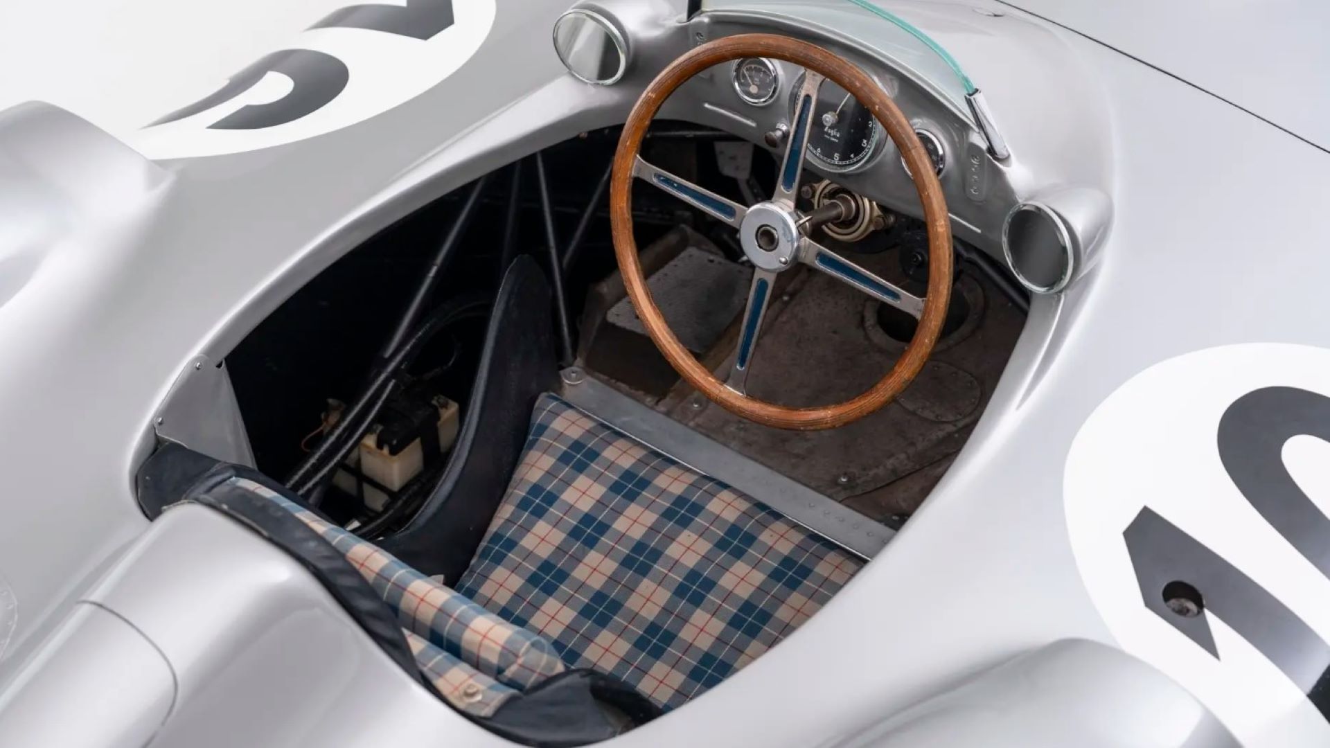 The historic auction event of the Mercedes-Benz W196R at the Mercedes-Benz Museum in Stuttgart
