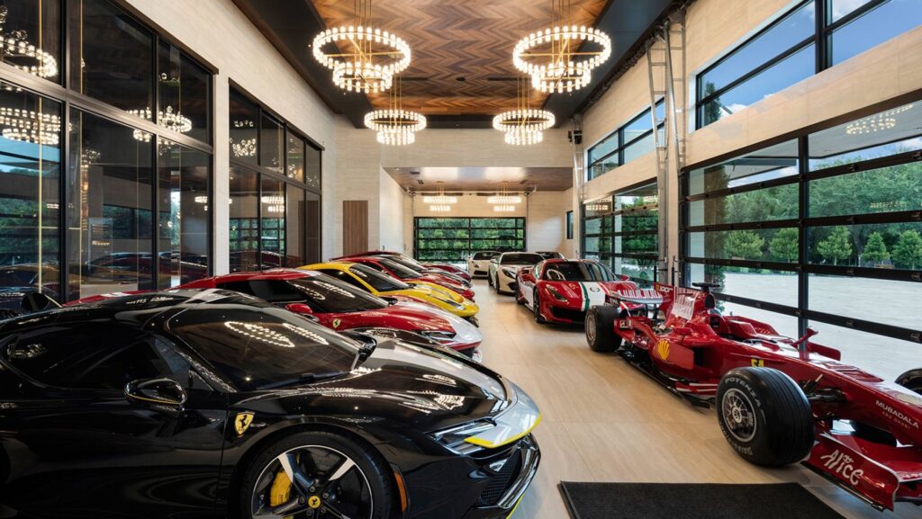 Ferrari auto gallery in Casa Maranello featuring SF90 and F1 car
