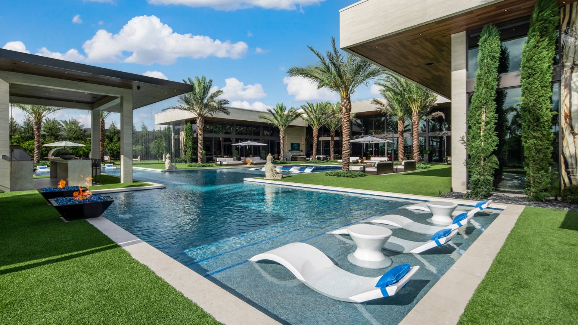 Outdoor sports facilities at Casa Maranello including a soccer field and basketball court