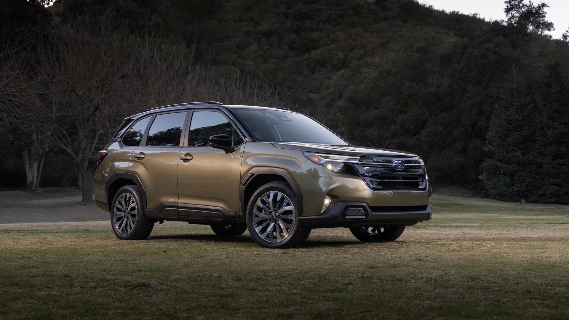 2025 Subaru Forester Hybrid showcasing its sleek design and unique Daybreak Blue Pearl color.