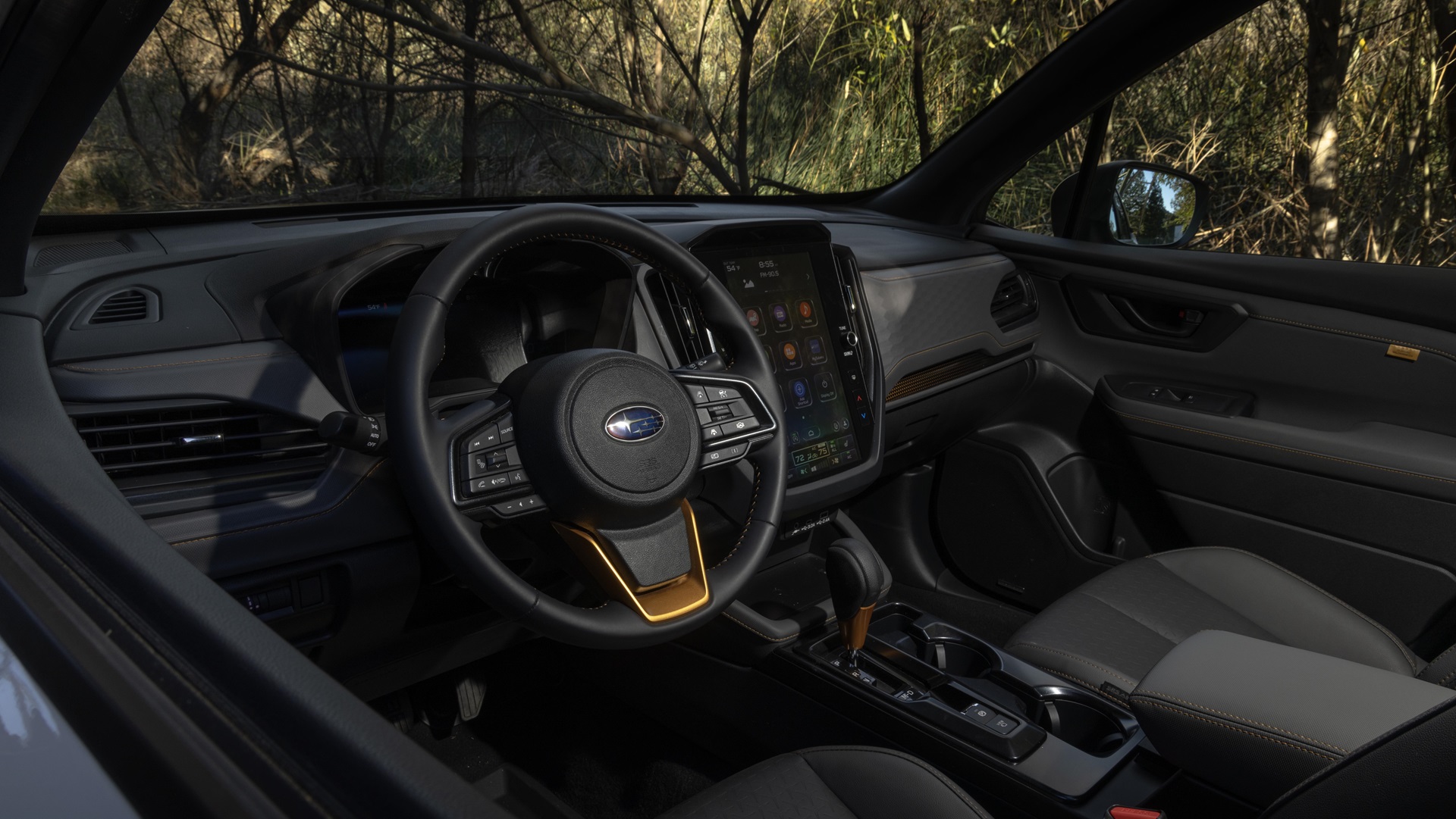2026 Subaru Forester Wilderness navigating rough terrain, showcasing its off-road capabilities.