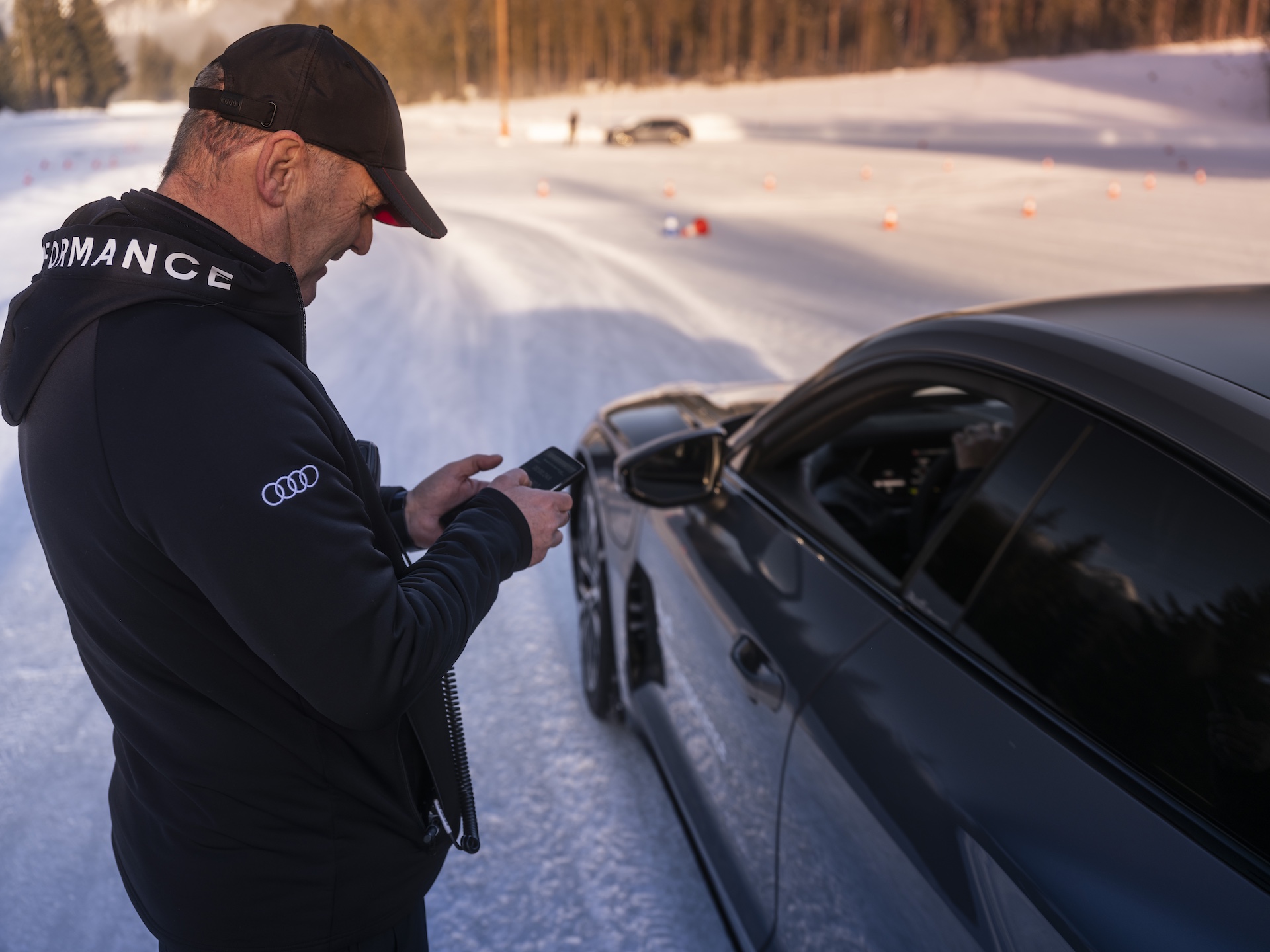 The 2025 Audi RS E-Tron GT Performance drifting on a frozen lake in Austria.