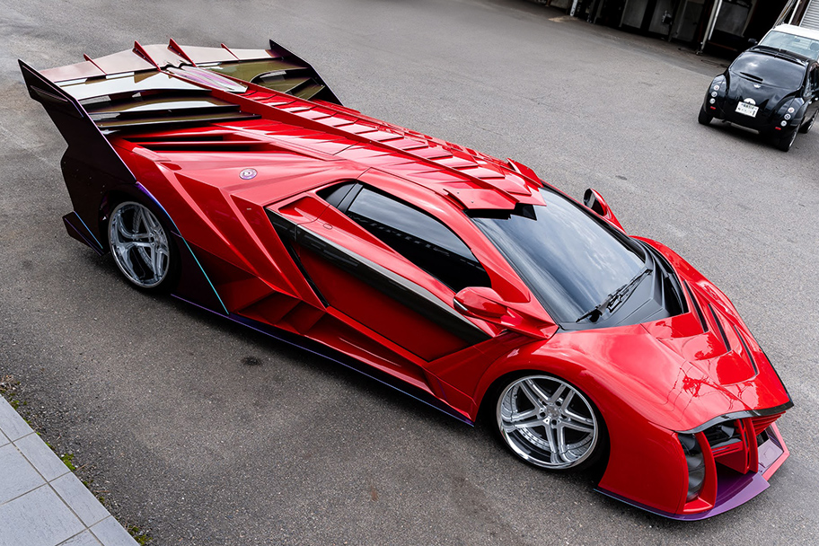 Detailed view of BEAST's engine bay showcasing its high-performance V12 engine layout